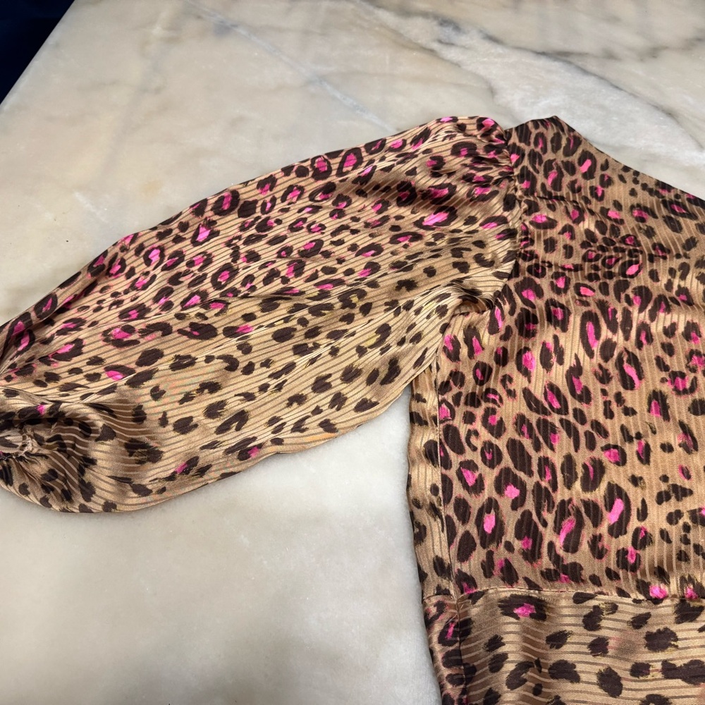 Express Animal Print Blouse with Pink Accents